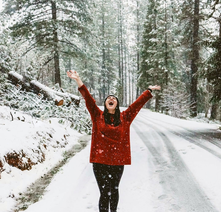 Student celebrating in the snow